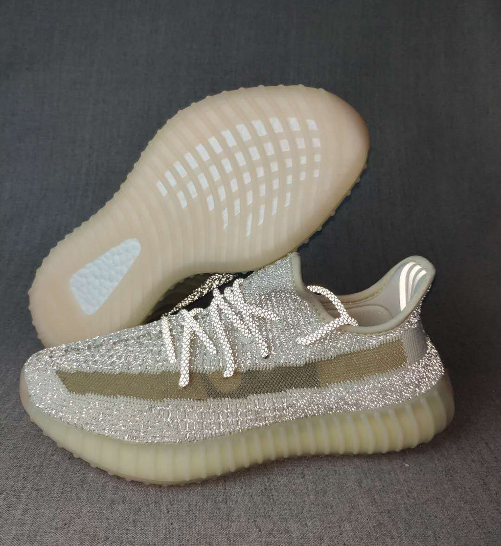 Light Gray and Cream Yeezy 350 V2 Knit Sneakers - product image from the listing.