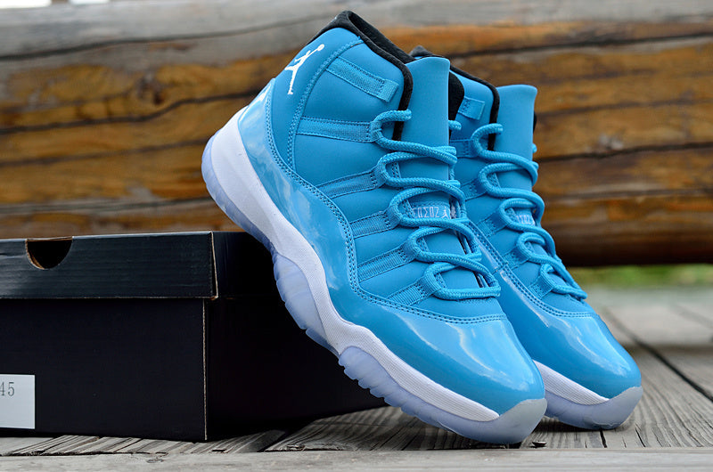 Blue and White Air Jordan 11 High Sneakers - product image from the listing.