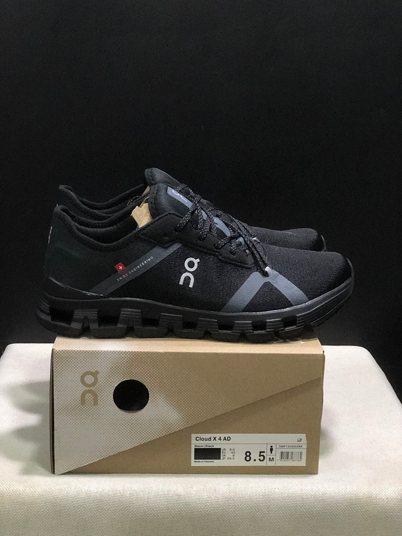 On Cloud X 4 AD Sneakers in Black - product image from the listing.