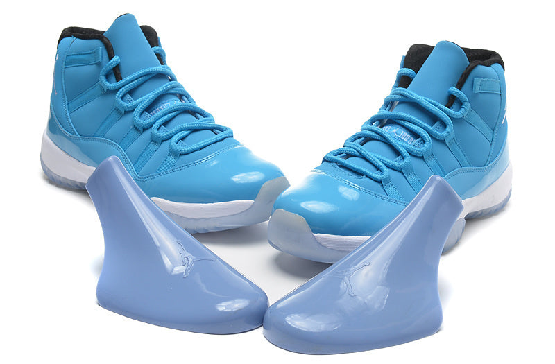 Blue and White Air Jordan 11 High Sneakers - product image from the listing.