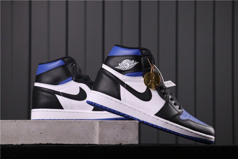 Air Jordan 1 Game Royal High-Top Sneakers in Black Blue White - product image from the listing.