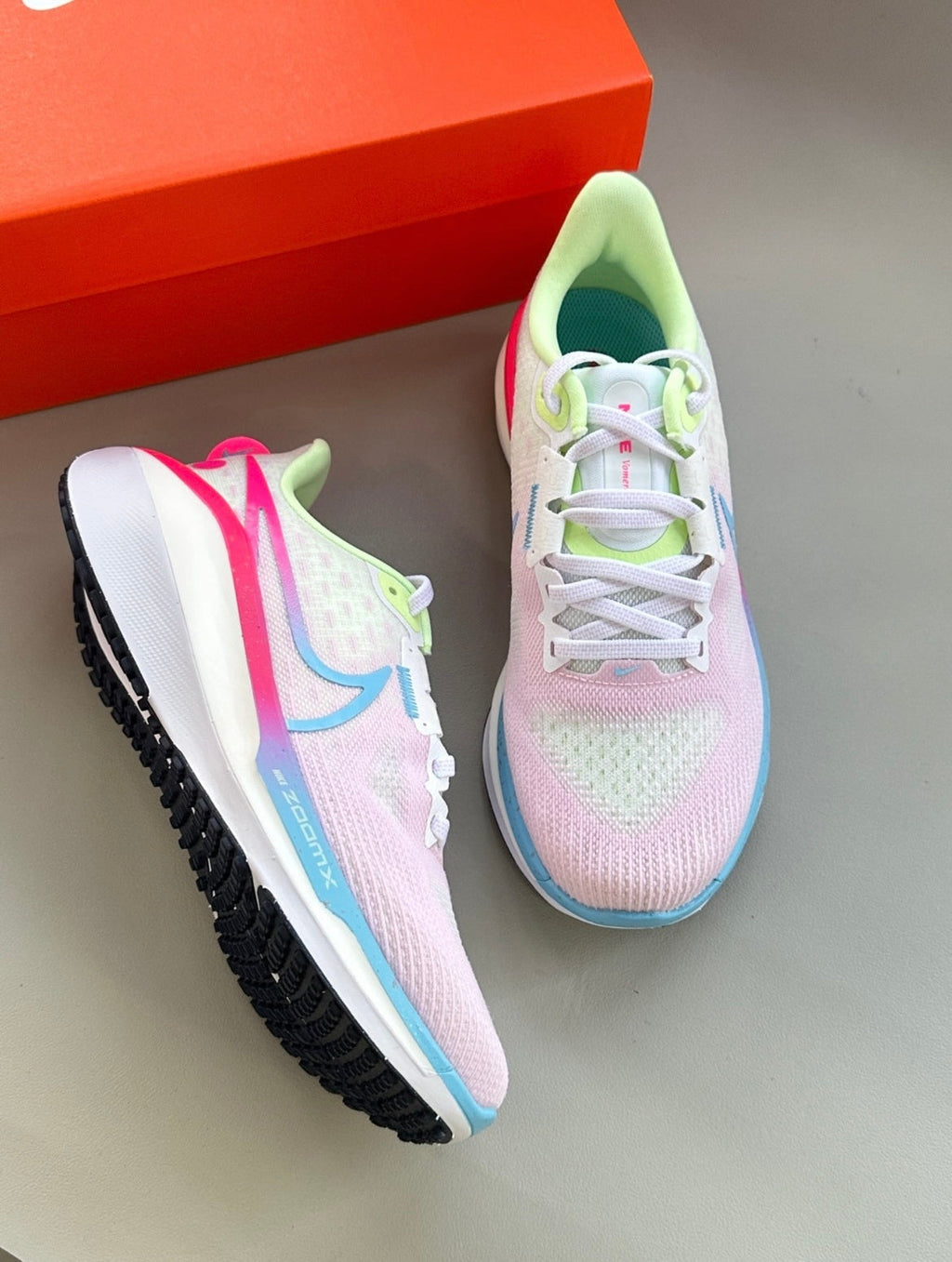 Nike Air Zoom Vomero 17 Running Shoes FZ3974-686 in Pink - product image from the listing.