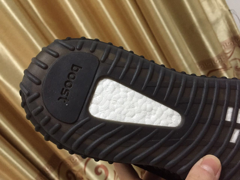 Black and Beige Yeezy 350 V2 Knit Sneakers - product image from the listing.