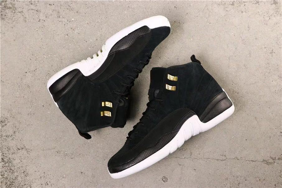 Air Jordan 12 Reverse Taxi Sneakers Black 153265-017 - product image from the listing.