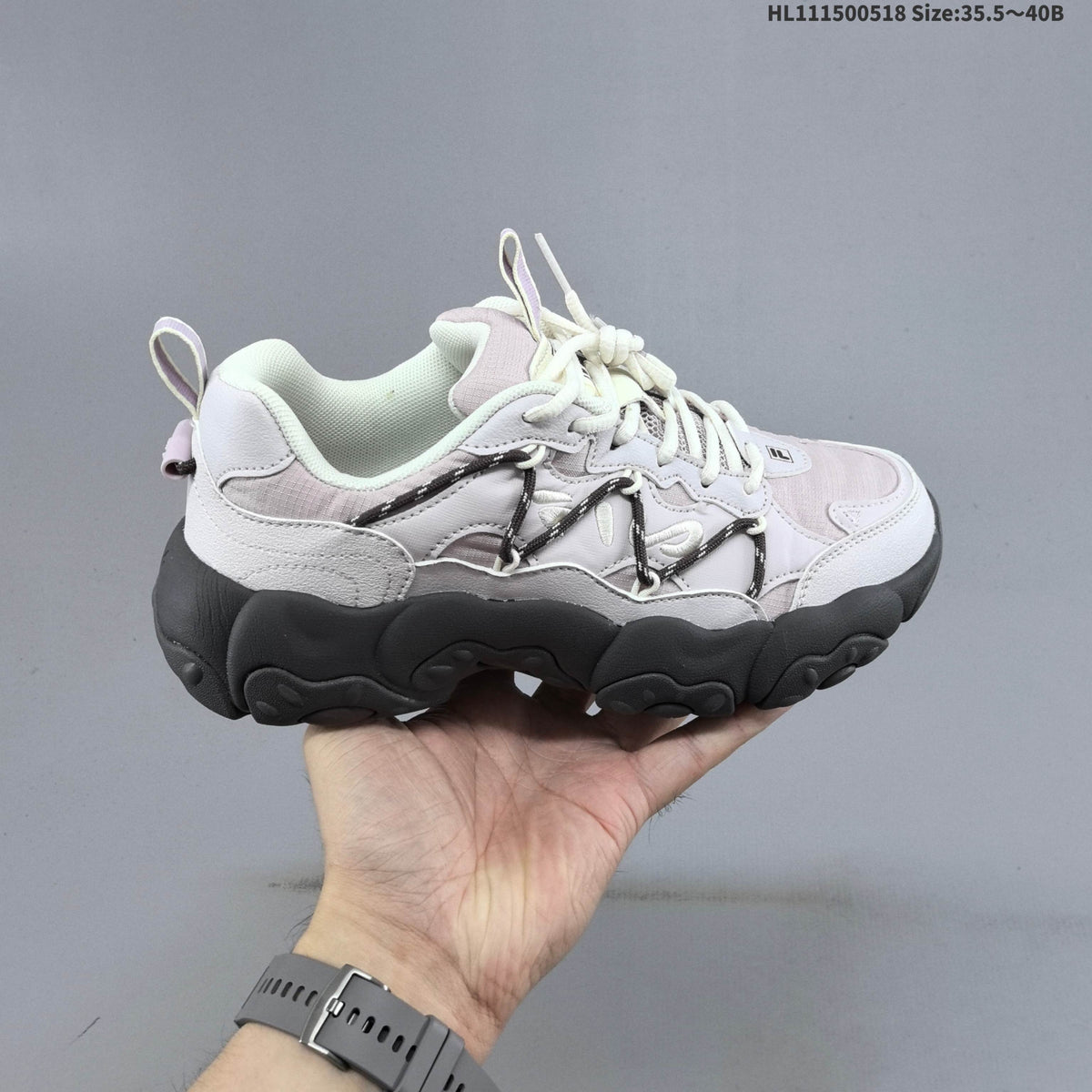 FILA Fluid 6 Low-Cut Sneakers in White and Lilac - product image from the listing.