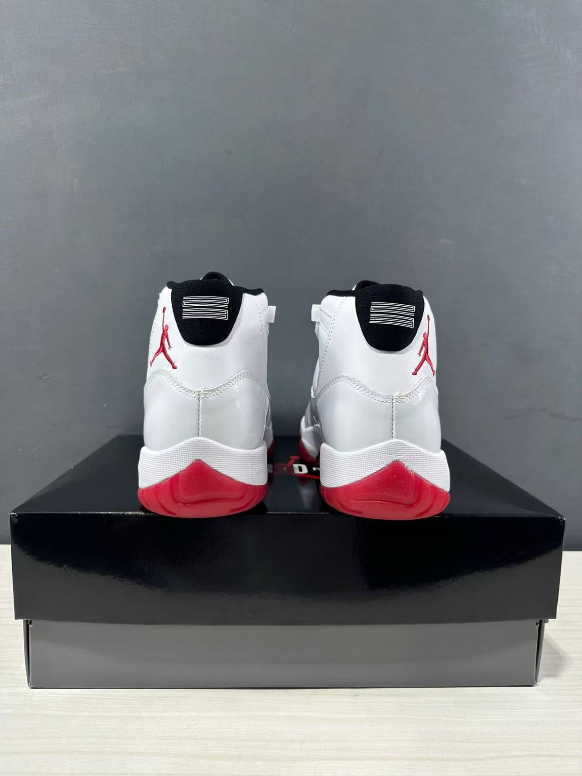 Air Jordan 11 Retro Low White Red CT8012-160 - product image from the listing.
