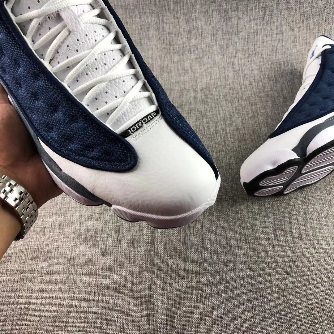 Air Jordan 13 Flint Navy Sneakers 414571-404 - product image from the listing.