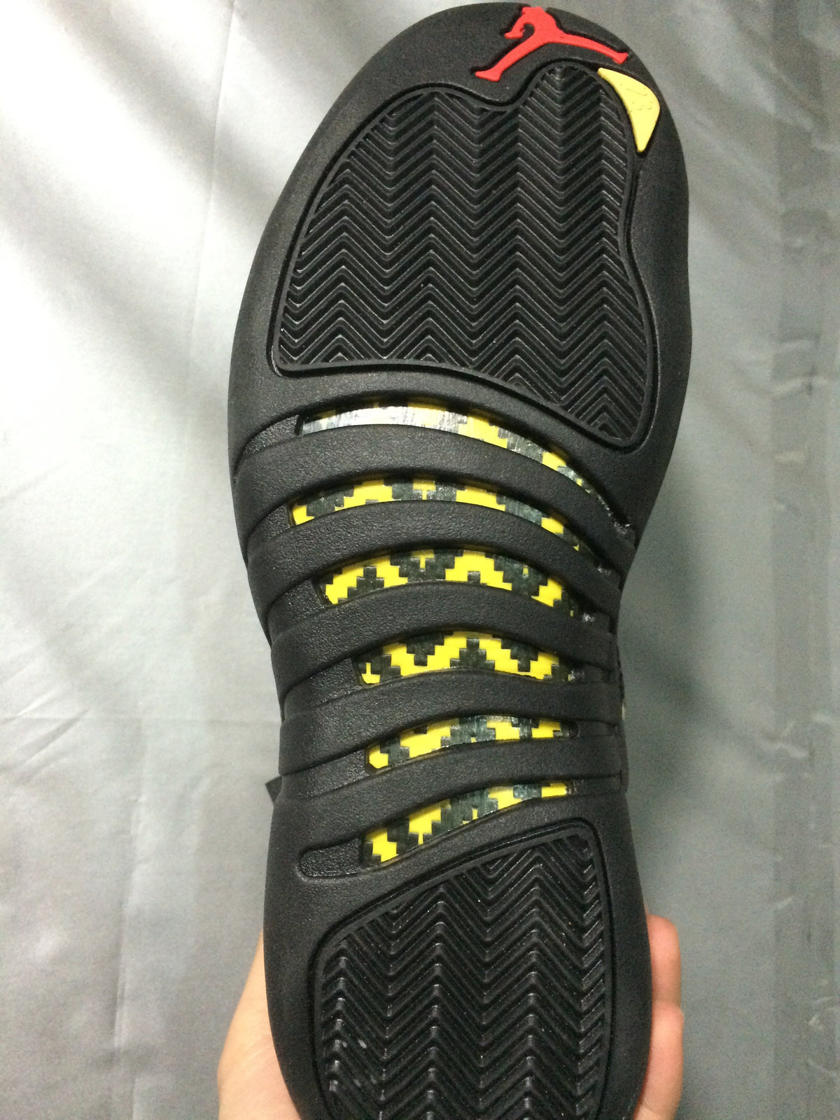 Air Jordan 12 Retro White and Black High-Top Sneakers - product image from the listing.