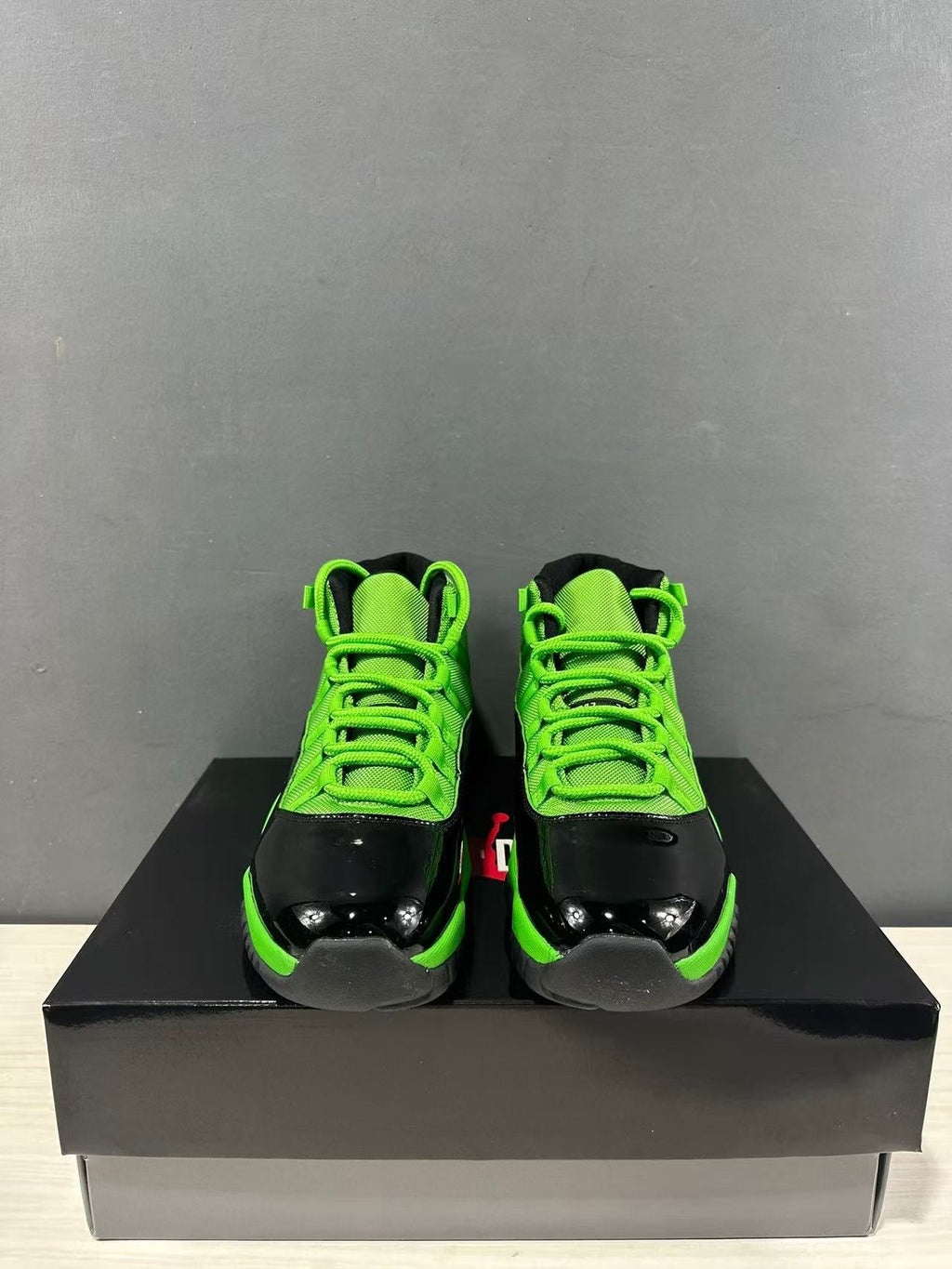 Air Jordan 11 Retro Sneakers in Black Green CT8012-310 - product image from the listing.