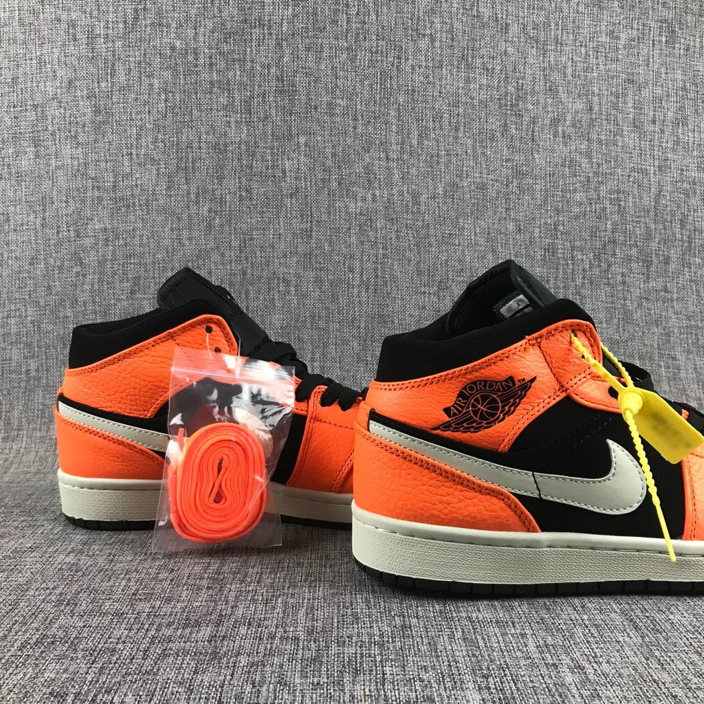 Air Jordan 1 Mid Shattered Backboard Sneakers, in Black and Orange - product image from the listing.