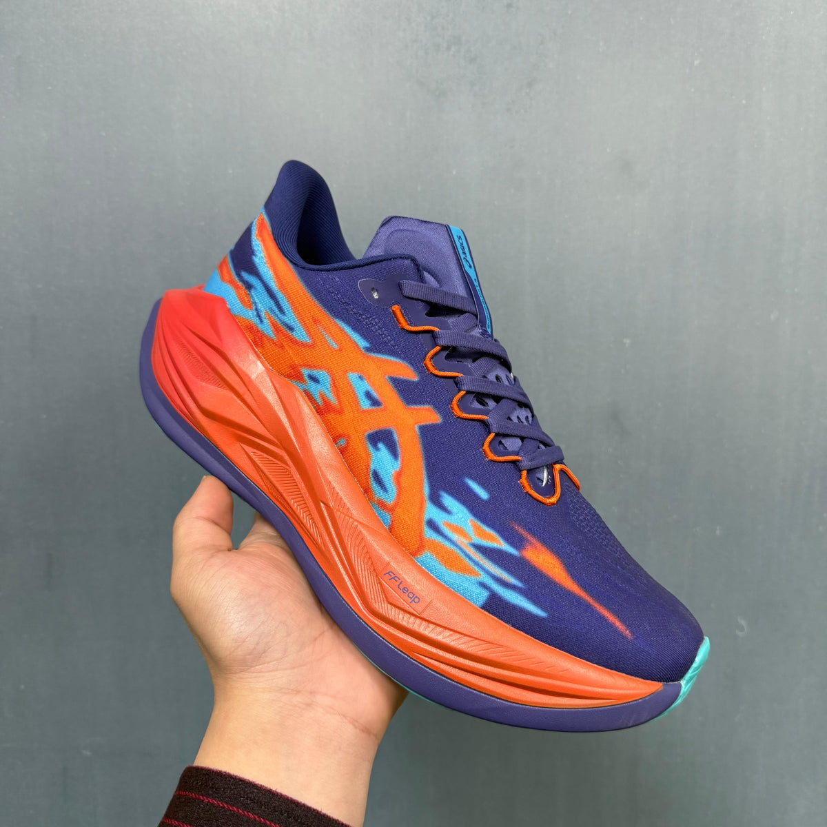 361° P6 Running Shoes in Purple, in Orange and Aqua - product image from the listing.