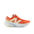 Orange and White New Balance FuelCell Running Shoe - product image from the listing.