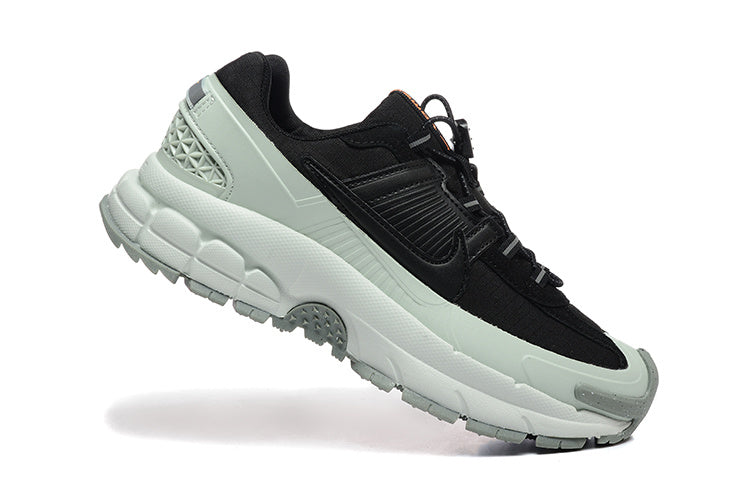 Nike ACG Lowcate Sneakers in Black and Grey - product image from the listing.