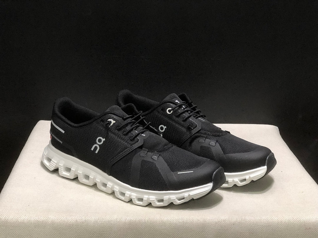 On Cloud 6 Running Sneakers in Black White - product image from the listing.