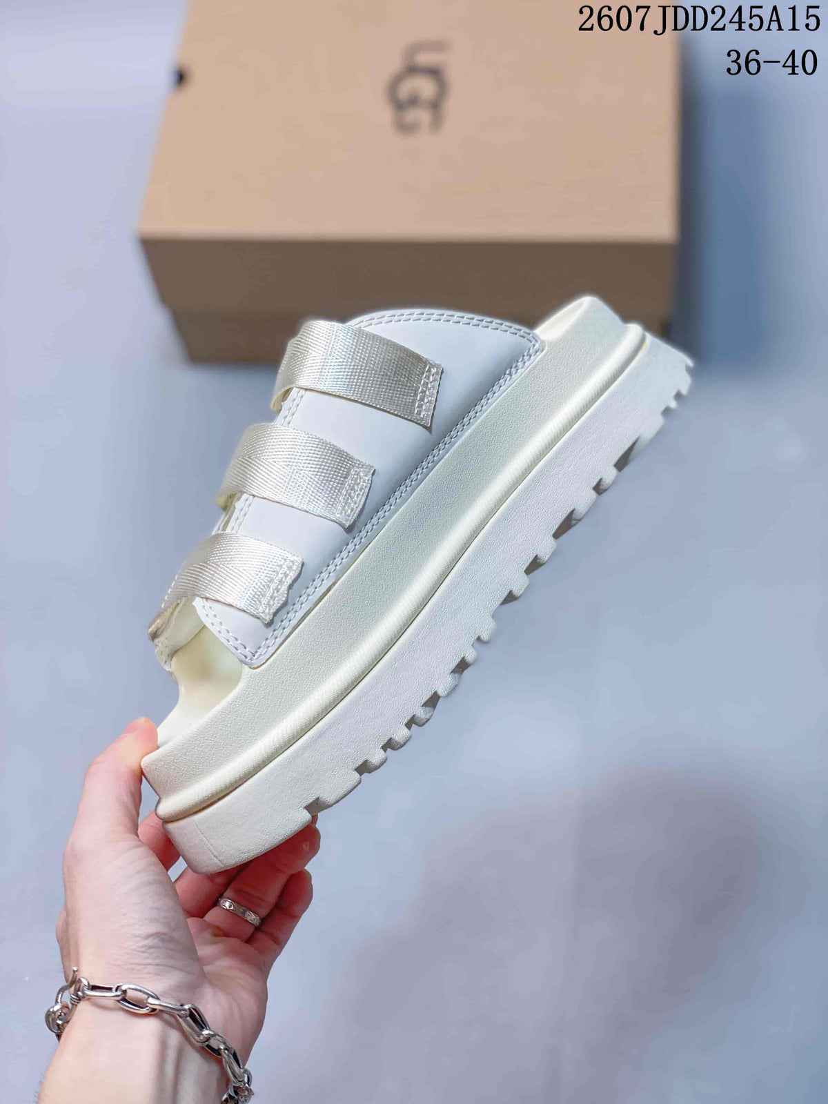White UGG GoldenGlow Slide Sandals - product image from the listing.