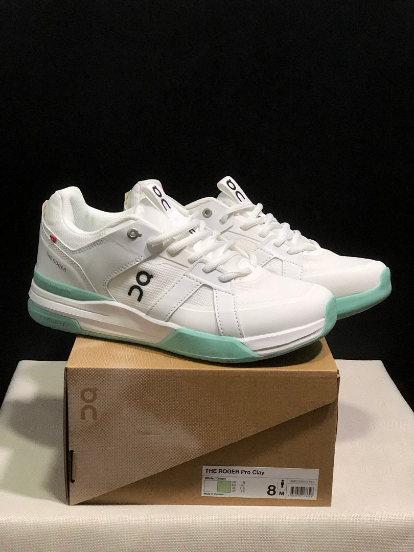 On THE ROGER Clubhouse Pro Tennis Shoes in White Mint Green - product image from the listing.