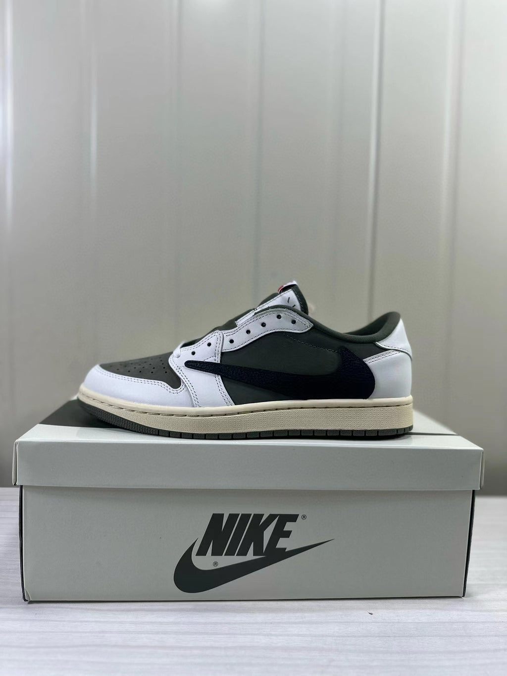 Air Jordan 1 Low OG DM7866-200 Sneakers - product image from the listing.