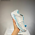 Nike Air Zoom Vomero 5 Sneakers in White and Blue - product image from the listing.