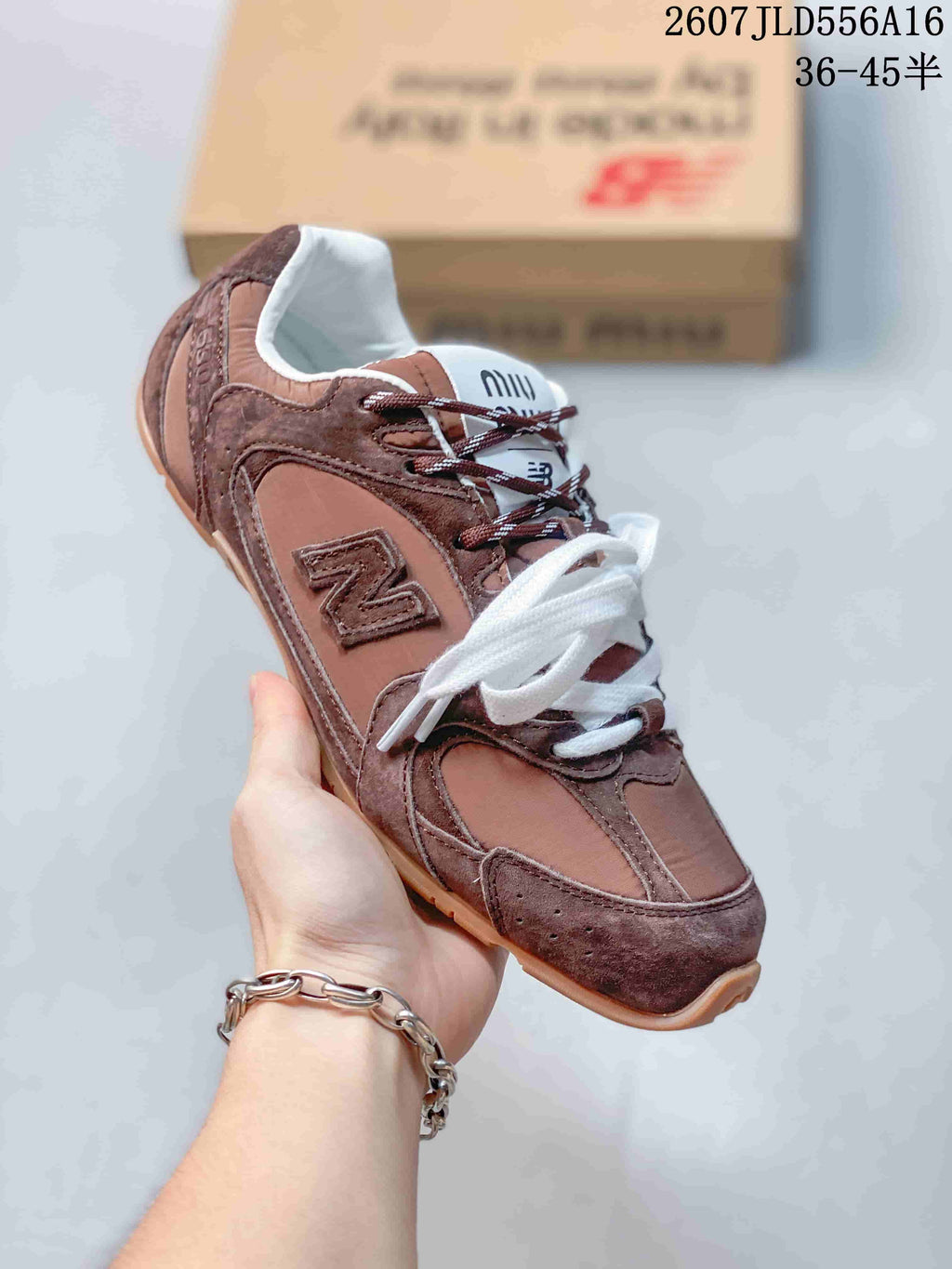 Miu Miu x New Balance 530 SL Sneakers Green or in Brown 2607JLD556A16 - product image from the listing.
