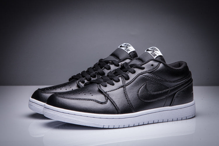 Air Jordan 1 Low Black and White Sneakers - product image from the listing.
