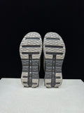 On Cloudtilt Remix Trainers in White and Pebble - product image from the listing.
