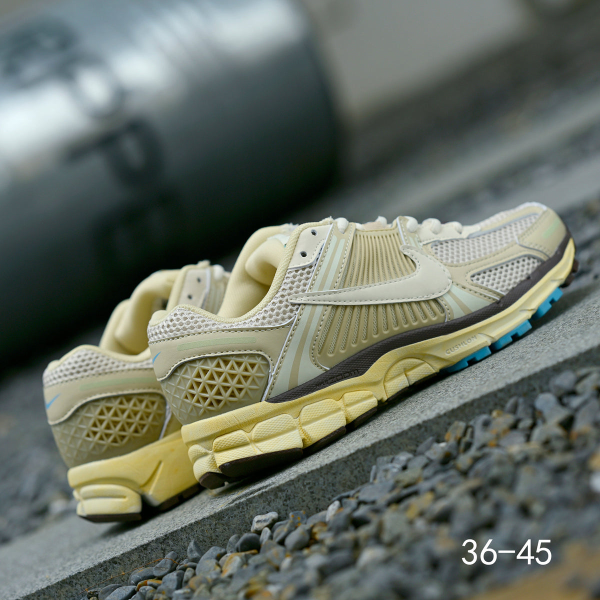 Pale Green and Blue Nike Air Zoom Vomero 5 Sneakers - product image from the listing.