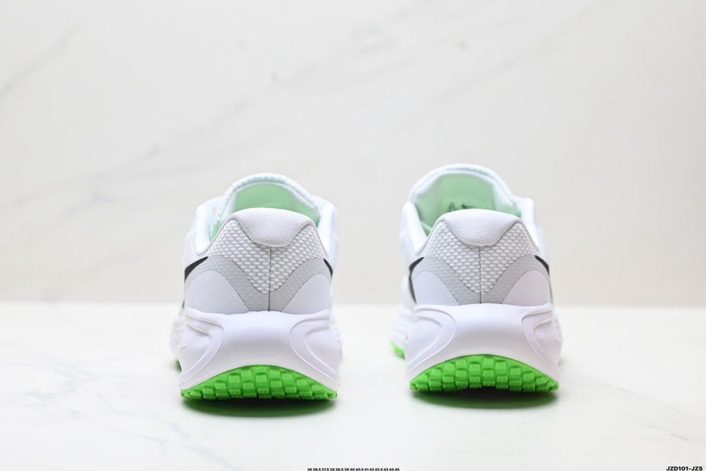 Nike Revolution 8 Running Shoes in White and Green - product image from the listing.