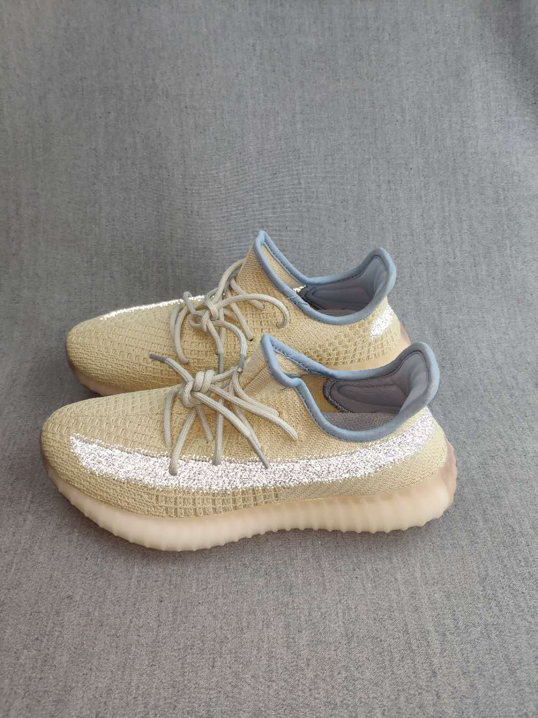 Beige Yeezy Boost 350 V2 Reflective Knit Sneakers - product image from the listing.