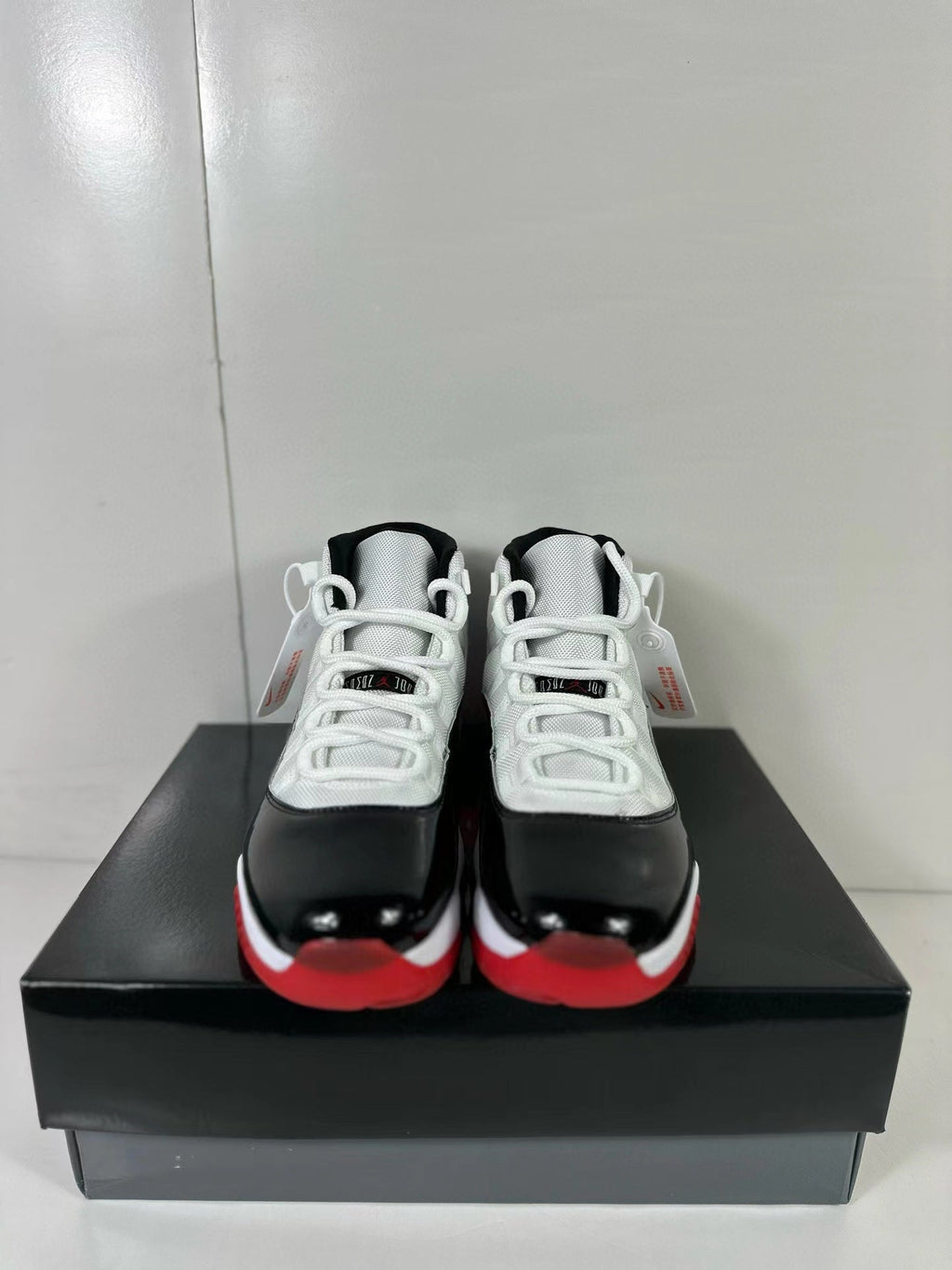 Air Jordan 11 Retro Concord Bred Sneakers CT8012-106 - product image from the listing.