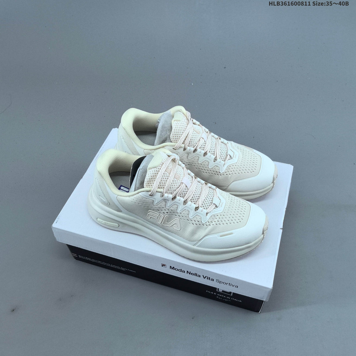 Ivory FILA Pebble Sandal Sneakers - product image from the listing.