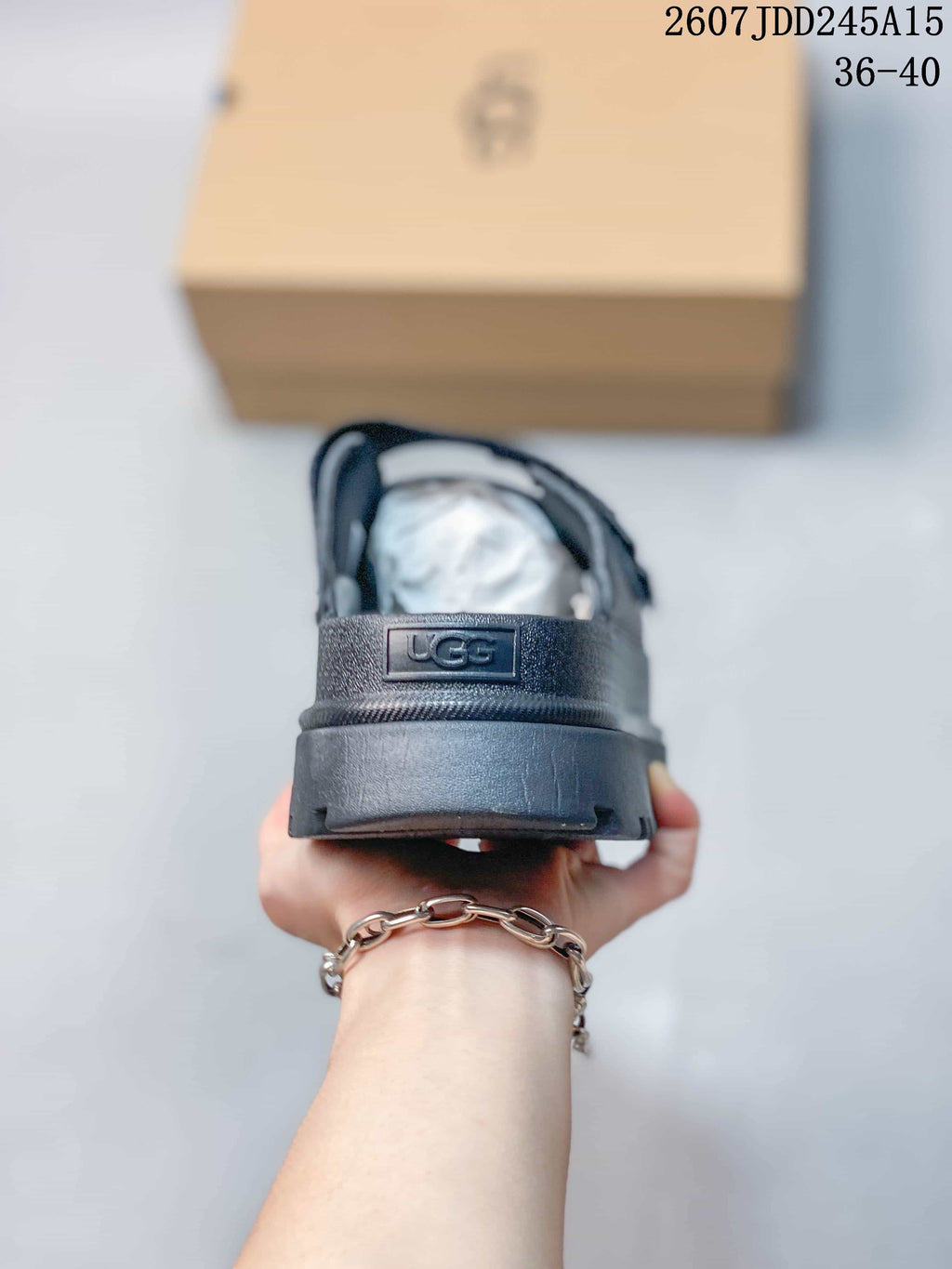 GoldenGlow Black Platform Slide Sandals 07JDD245A15_002 by UGG - product image from the listing.