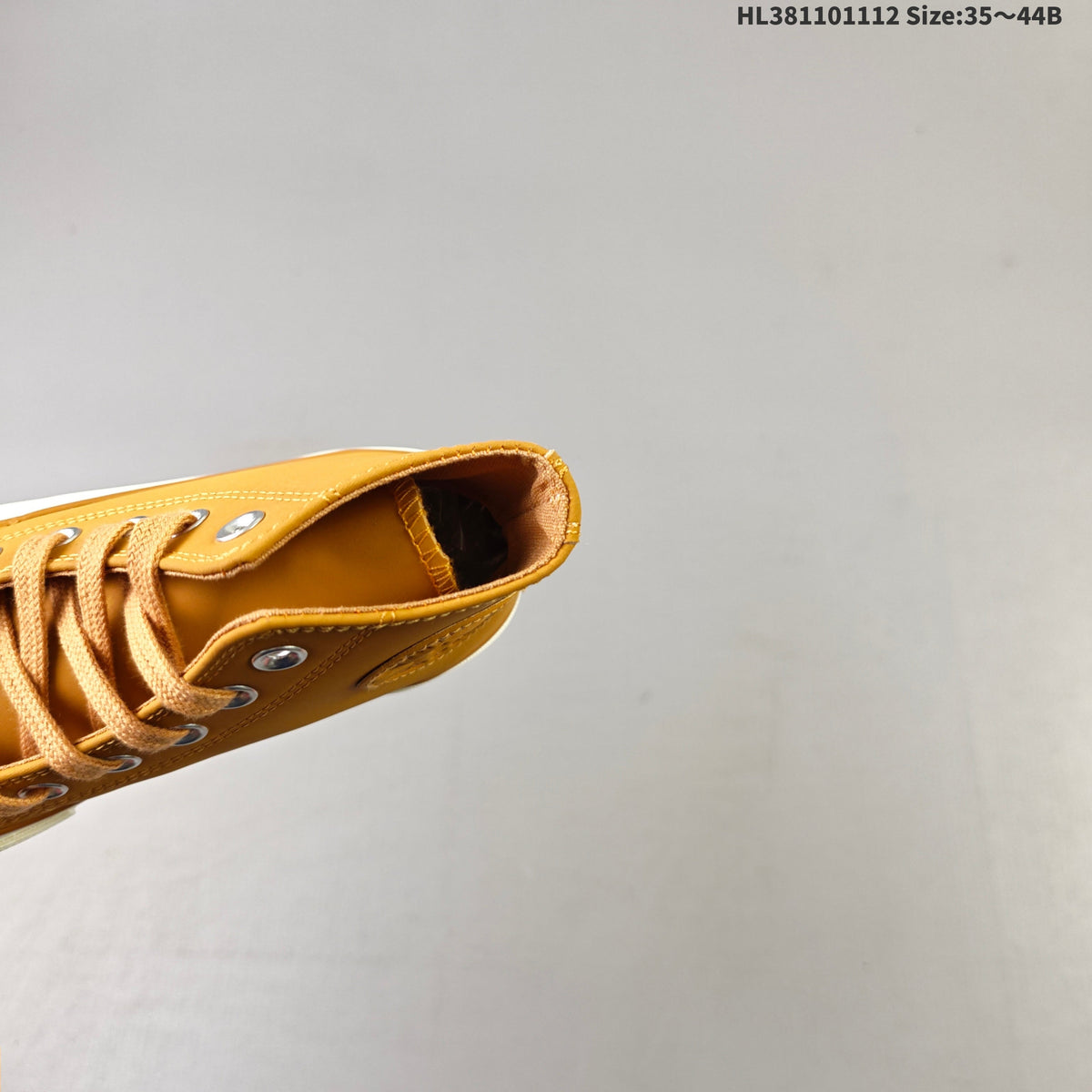Converse Chuck 70 High Top Trainers in Mustard - product image from the listing.