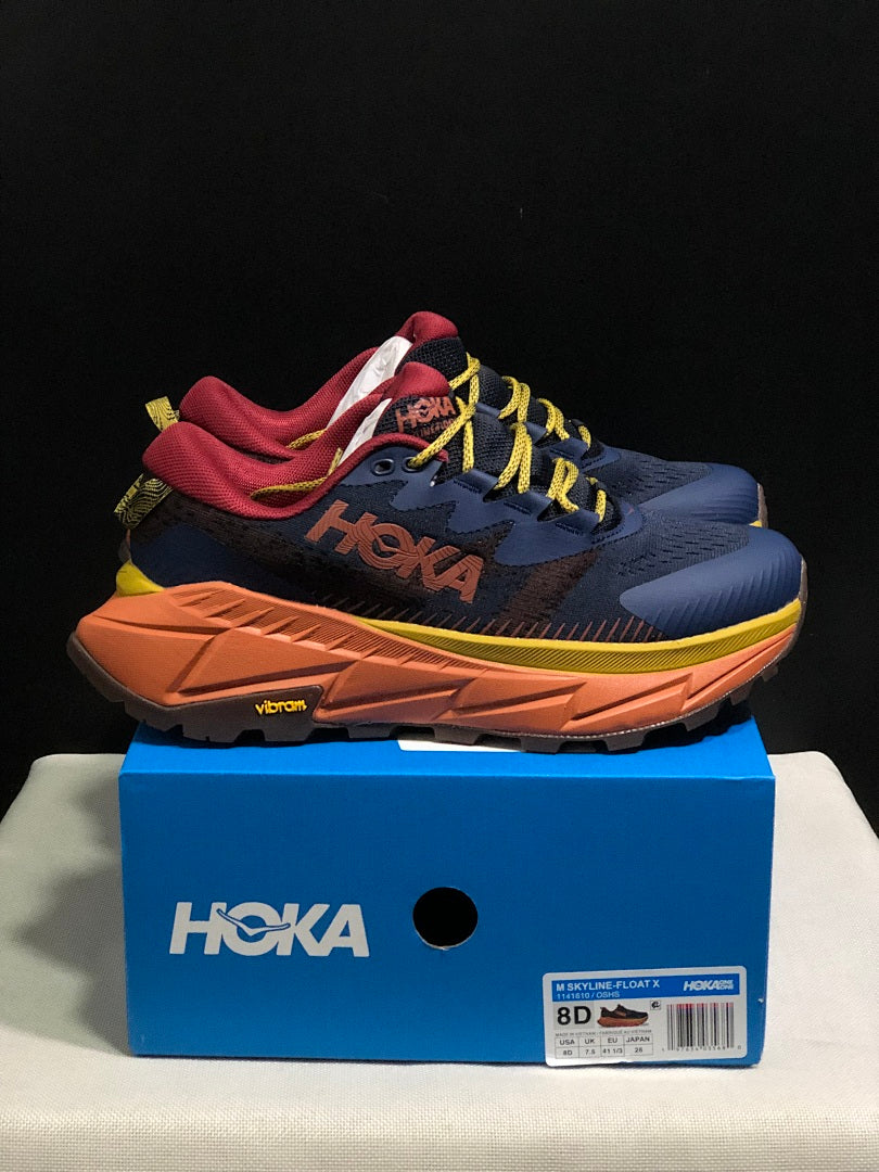 HOKA Skyline Float X Trail Sneakers in Navy Orange - product image from the listing.