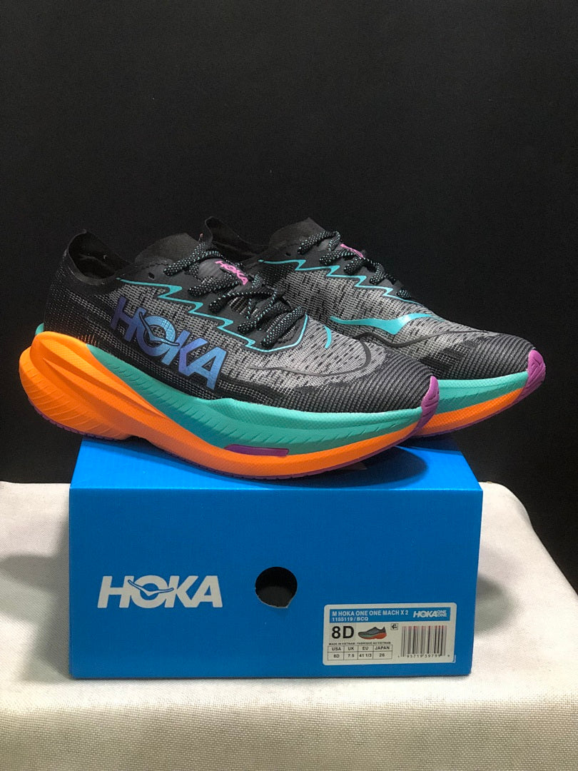HOKA Mach X 2 Running Shoes, in Black and Turquoise - product image from the listing.