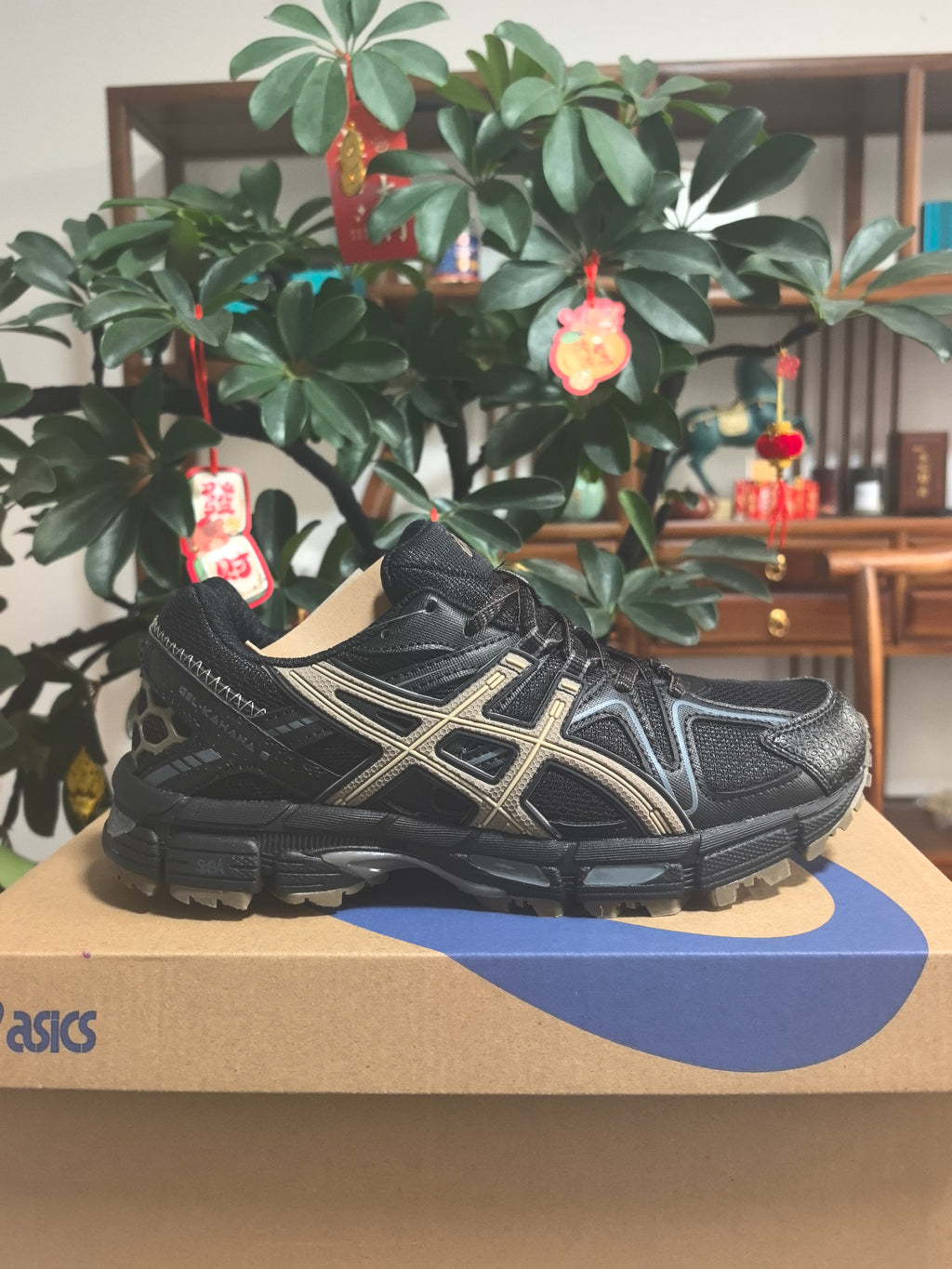 Black and Brown ASICS Gel-Kahana 8 Sneakers - product image from the listing.