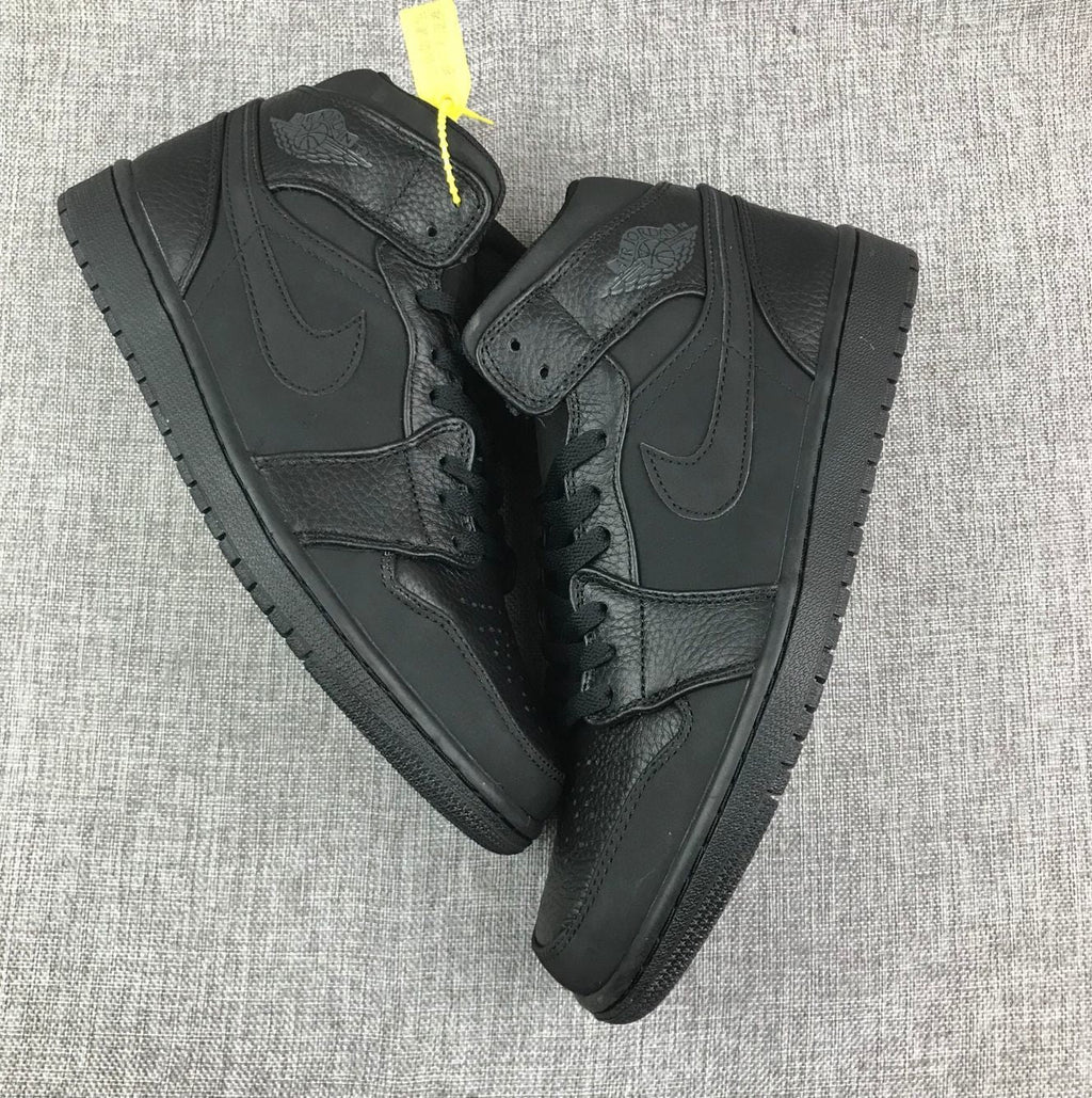 Air Jordan 1 Mid Sneakers, in Black - product image from the listing.