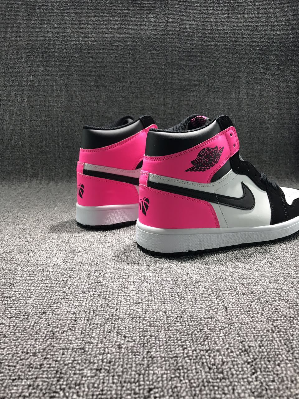 Jordan 1 High Valentine's Day Sneakers in Black Pink - product image from the listing.