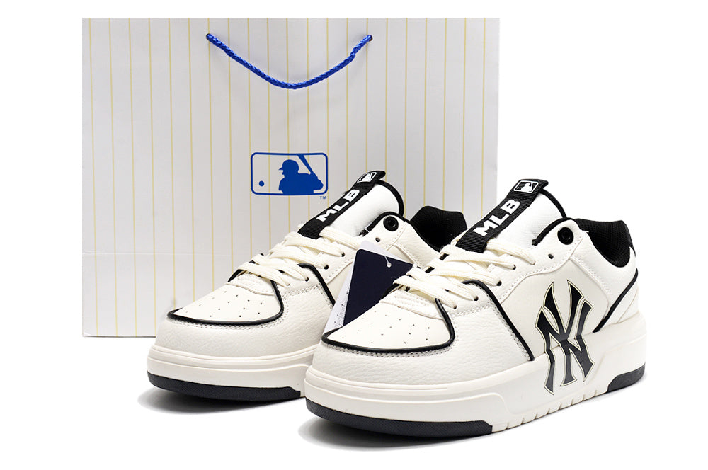 MLB New York Yankees Low-Top Sneakers in White and Black - product image from the listing.
