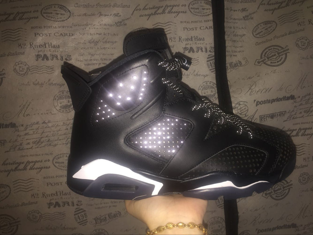 Jordan 6 Retro Black Cat High-Top Sneakers in Black and White - product image from the listing.