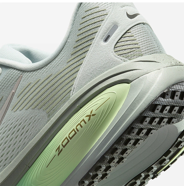 Nike Vomero 18 Running Shoes in Gray Green HM6803-002 - product image from the listing.