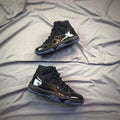 Air Jordan 11 Cap and Gown High-Top Sneakers in Black - product image from the listing.
