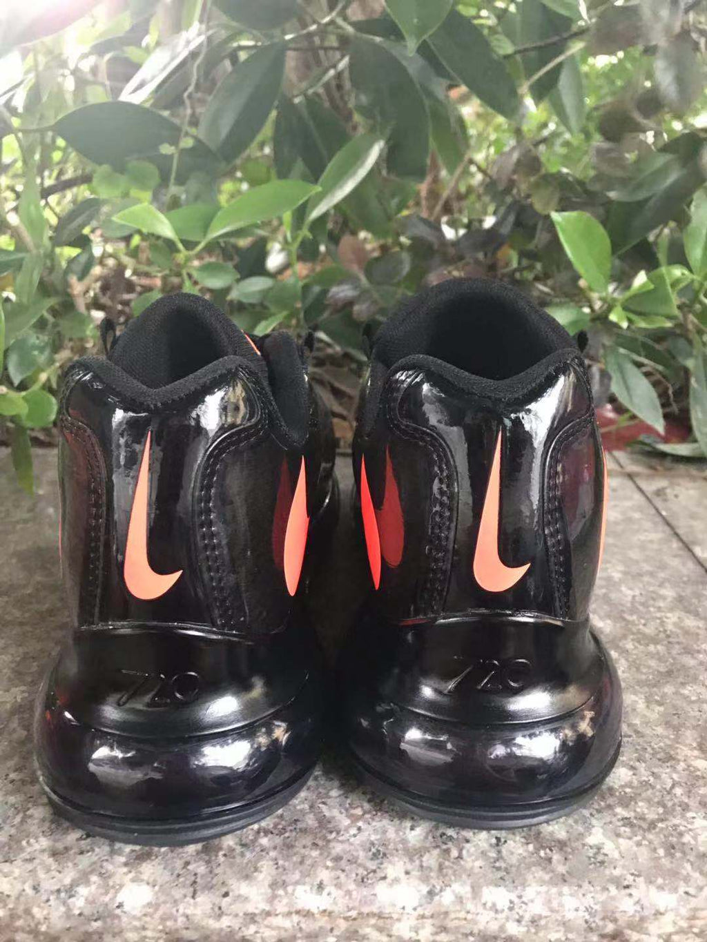 Nike Air Max 720 Sneakers in Black and Bright Orange - product image from the listing.