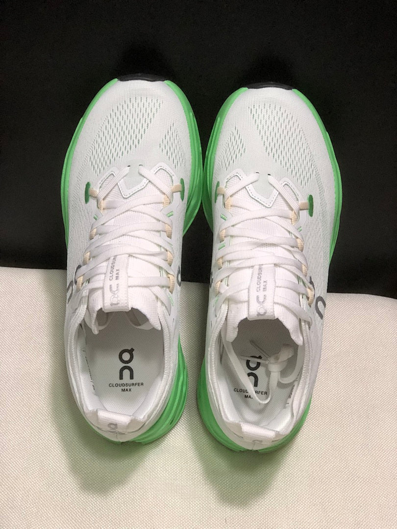 On Cloudsurfer Max Running Shoes in White Green - product image from the listing.