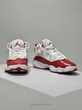 Jordan 6-3 Basketball Sneakers in White and Red - product image from the listing.