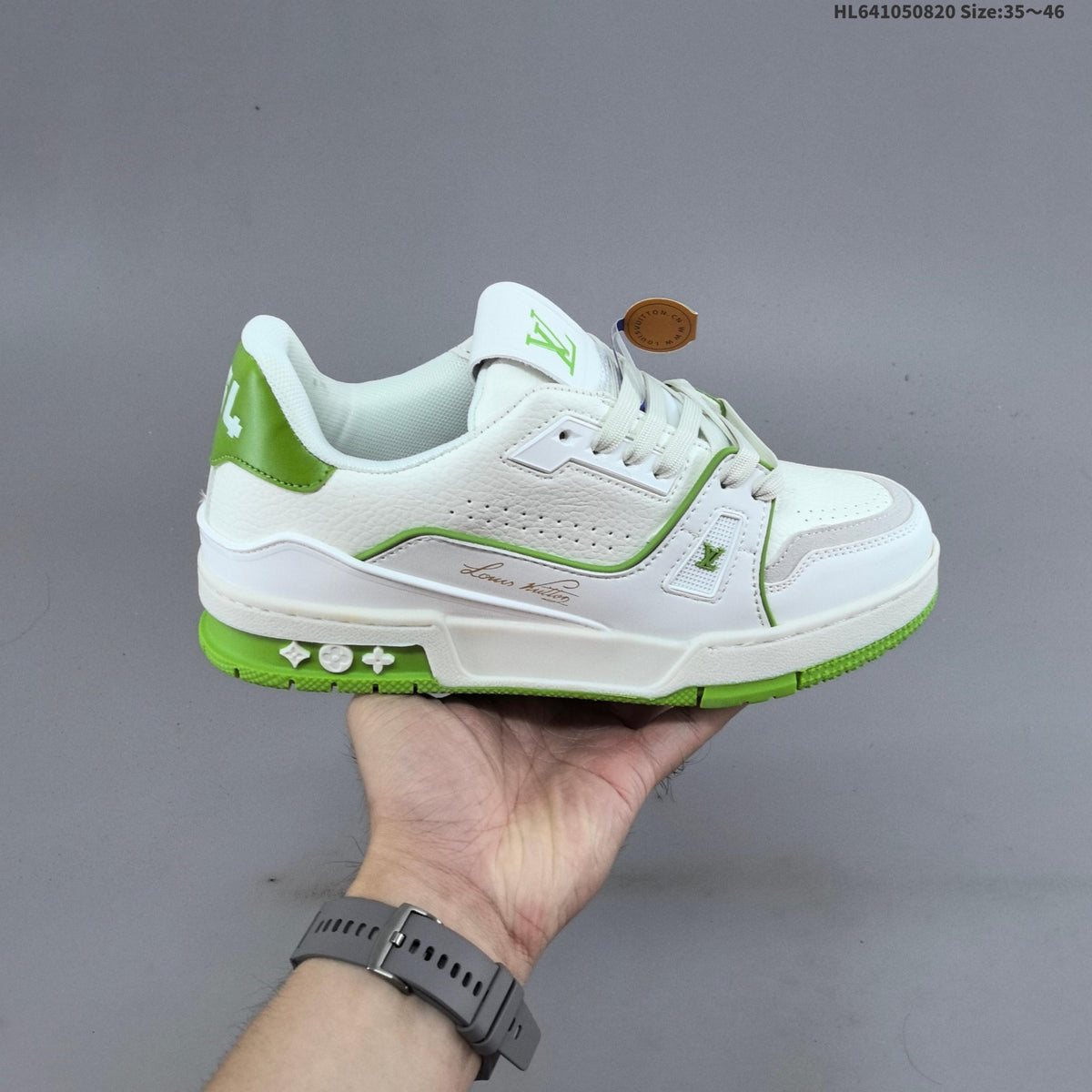 Louis Vuitton Trainer Low-Top Sneakers, in White and Green/Blue - product image from the listing.