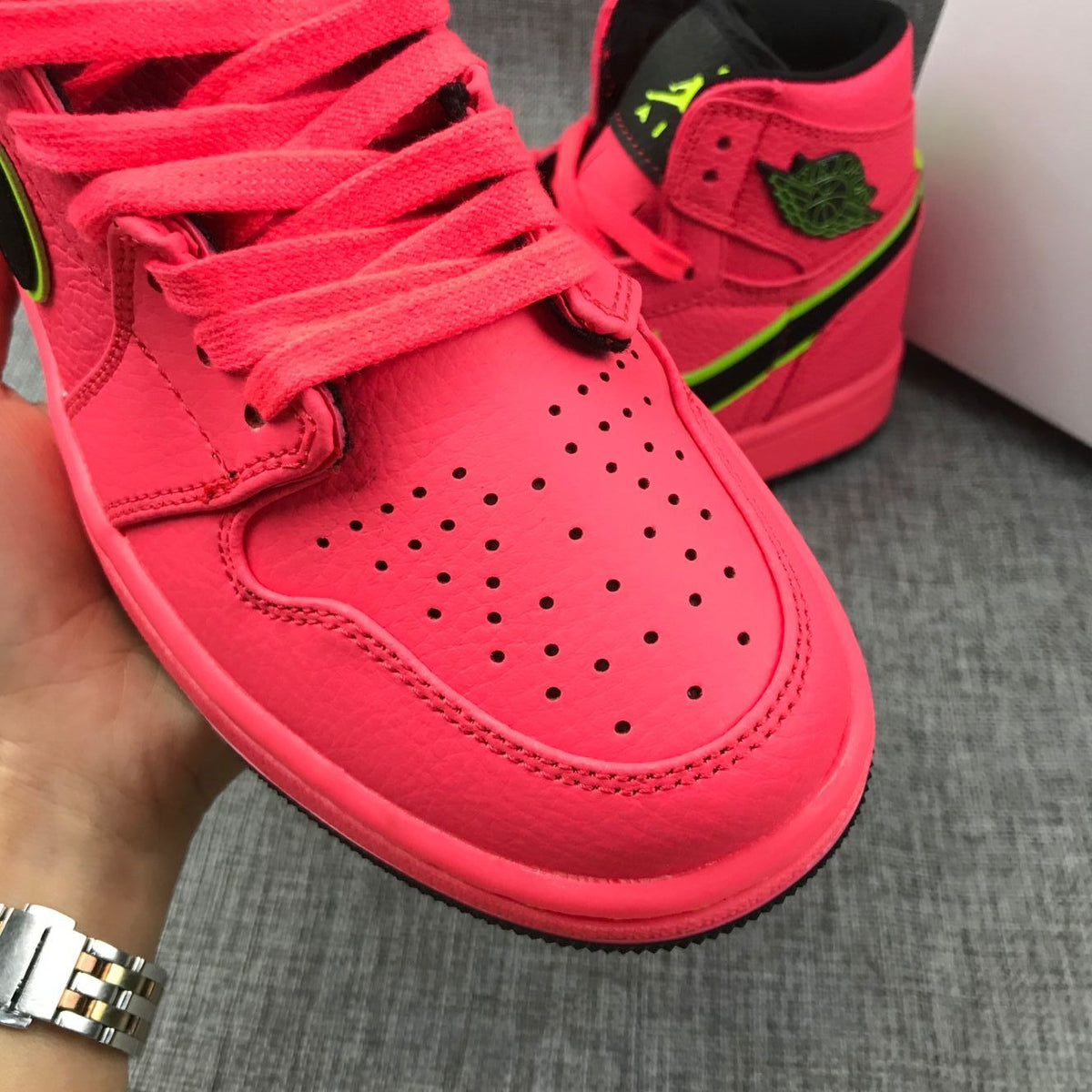 Pink and Black Air Jordan 1 Mid Sneakers AQ9131-600 - product image from the listing.