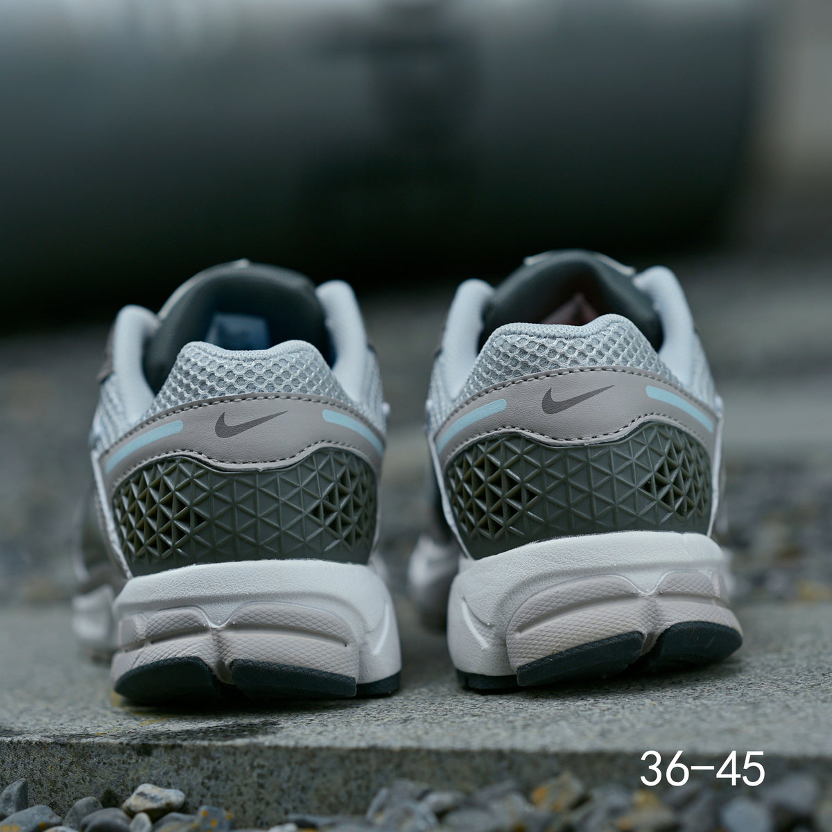 Grey Nike Air Zoom Vomero 5 Running Shoes - product image from the listing.