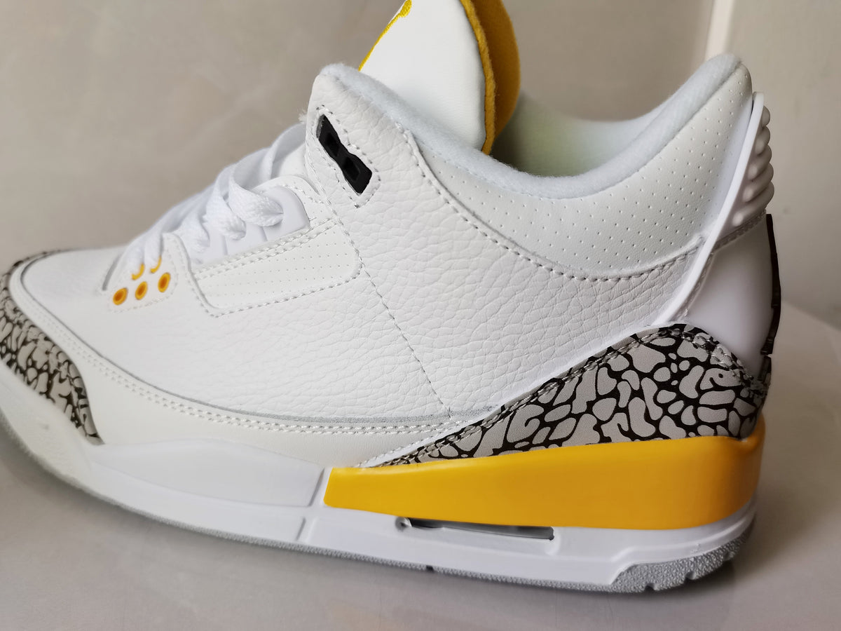 Air Jordan 3 Retro White and Yellow Sneakers - product image from the listing.