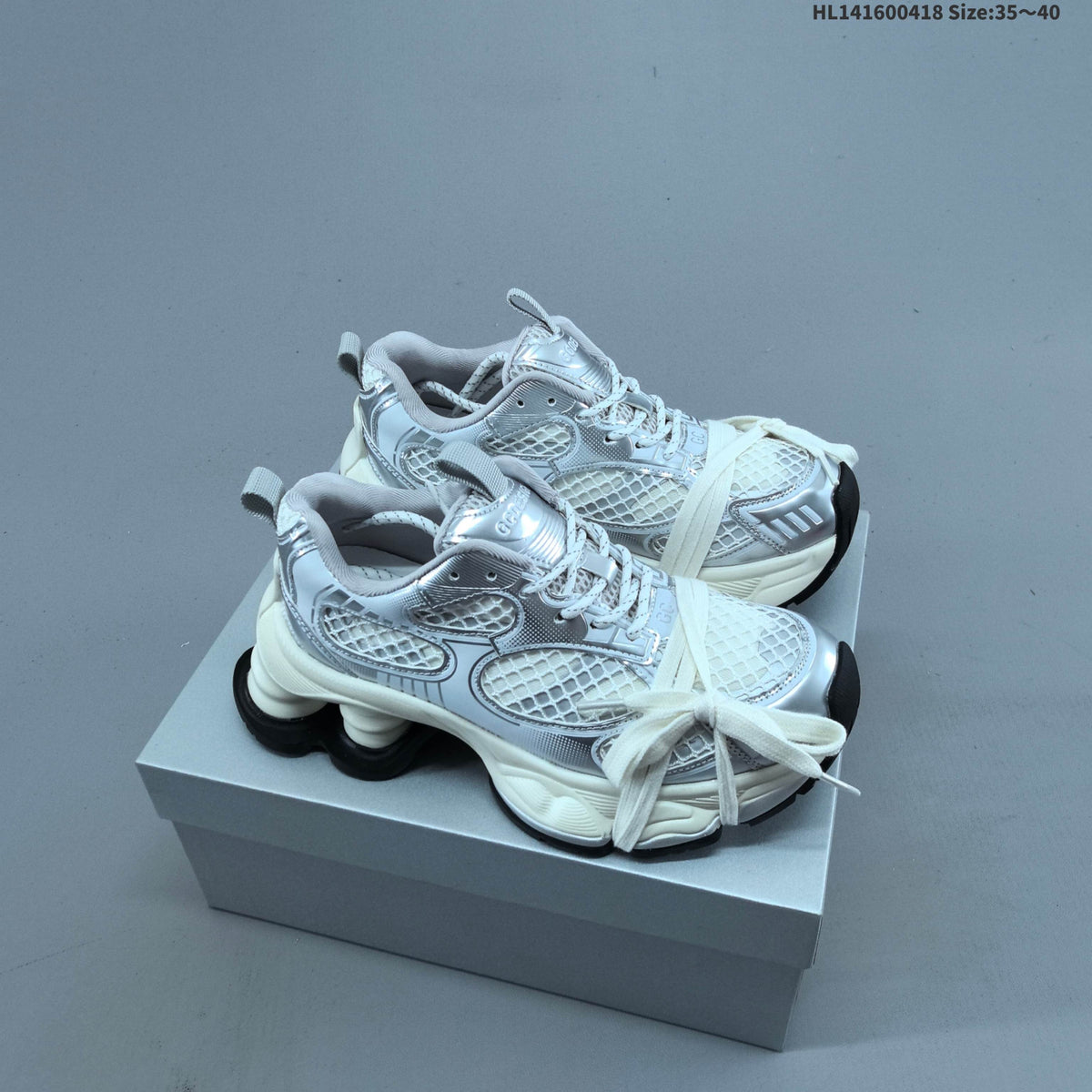Chunky Platform Trainers in Silver and White with Mesh Panels - product image from the listing.