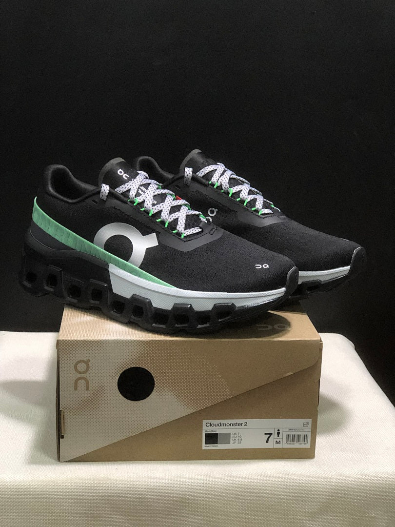 On Cloudmonster 2 Running Sneakers in Black Green - product image from the listing.